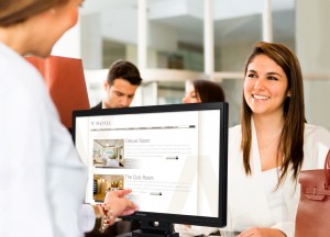 Woman doing check in at a hotel