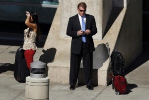 man-looking-at-his-mobile-reuters-635