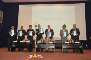 ICROIT-2014 held at MRIU_ Delegates unveiling the souvenir