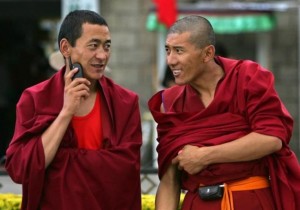 monks with smartphone