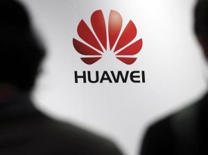 Journalists attend the presentation of the Huawei's new smartphone, the Ascend P7, launched by China's Huawei Technologies in Paris