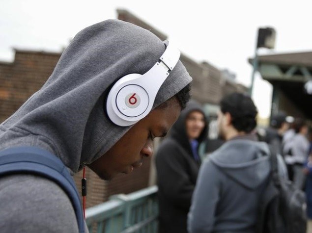 man using beats headphone