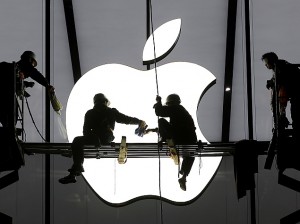 workers apple logo building