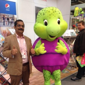 Manish Rajoria Director Aadarsh Pvt Ltd with Purple Turtle Mascot