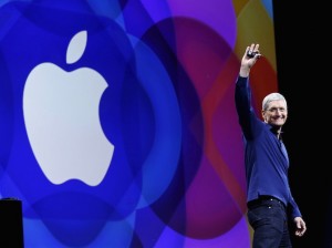 Apple CEO Tim Cook waves as he arrives on stage to deliver his keynote address at the Worldwide Developers Conference in San Francisco