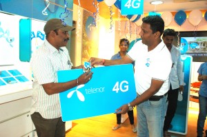 Shrinath Kotian, Circle Business Head-AP&TS, Telenor India (on right) ha...