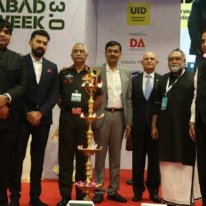 Dignitaries lighting the lamp at the inauguratio of ADW 3.0 at Karnavati University