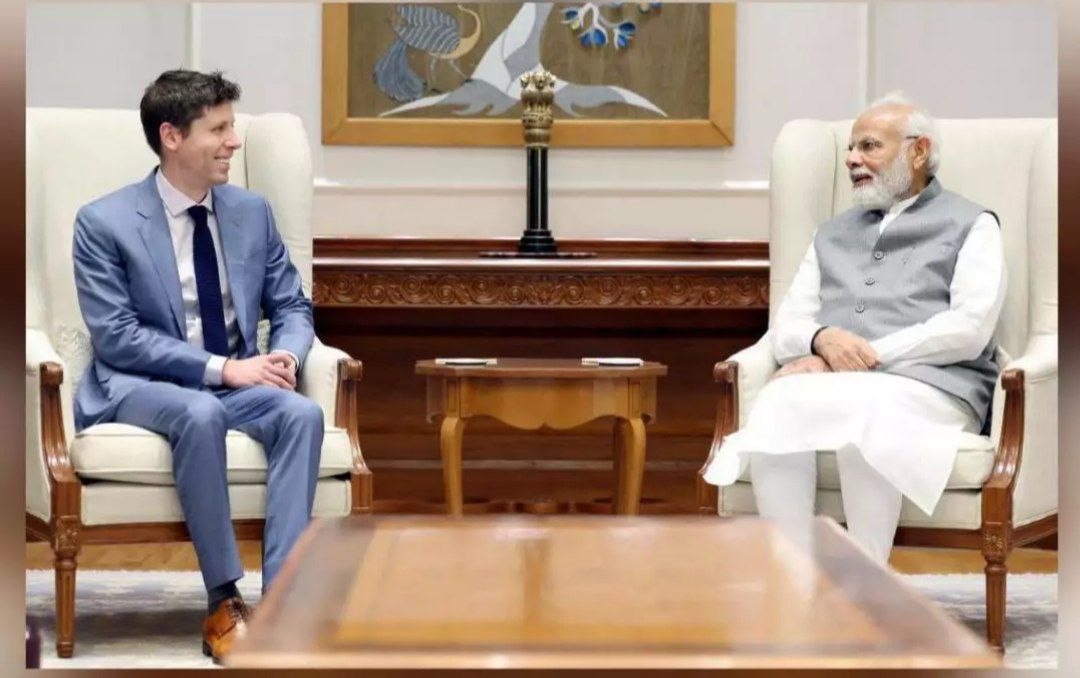 Sam Altman and Narendra Modi discussing AI development in Delhi
